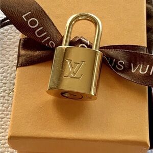 Louis Vuitton Luxurious Gold Lock